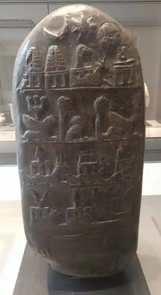Cross with rays on a babylonian stele